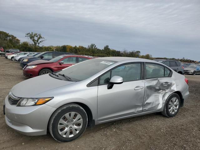 HONDA CIVIC LX 2012 with VIN 19XFB2E54CE064476 - Photo from auction