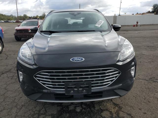 Photo 5 from auction – 2021 FORD ESCAPE TIT with VIN 1FMCU9J98MUA73257