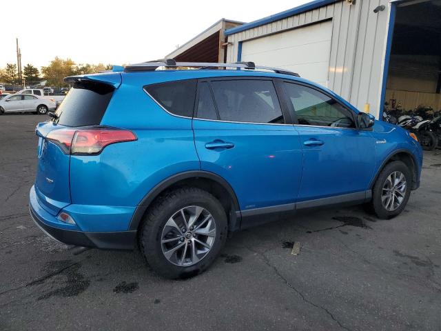 Photo 3 from auction – 2018 TOYOTA RAV4 HV LE with VIN JTMRJREV4JD215419
