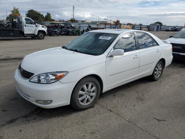 TOYOTA CAMRY LE 2003 with VIN 4T1BF30K73U036268 - Photo from auction