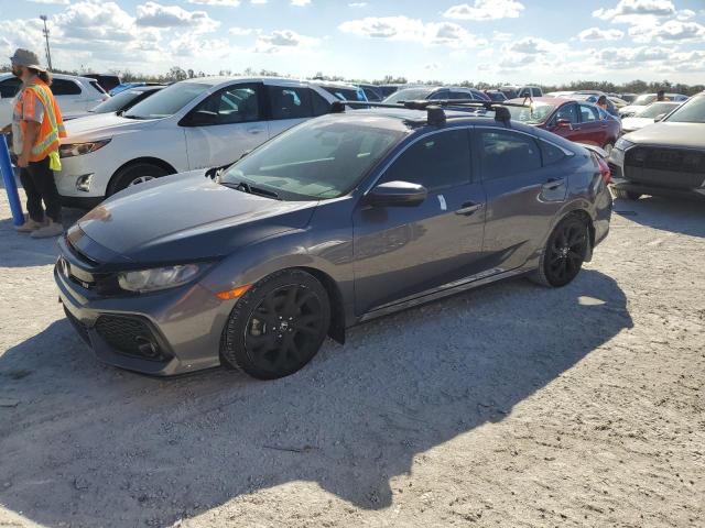 HONDA CIVIC SI 2017 with VIN 2HGFC1E51HH703174 - Photo from auction