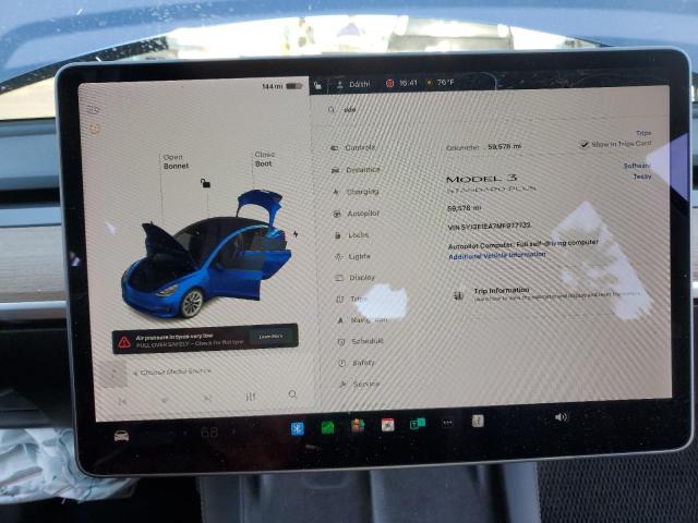 Photo 9 from auction – 2021 TESLA MODEL 3 with VIN 5YJ3E1EA7MF977732
