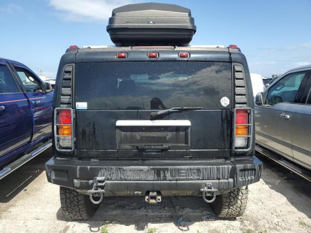 Photo 6 from auction – 2003 HUMMER H2 with VIN 5GRGN23U33H114427