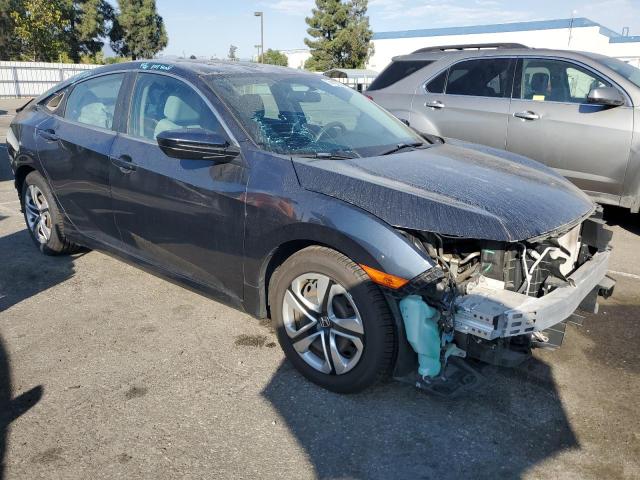 Photo 4 from auction – 2018 HONDA CIVIC LX with VIN 2HGFC2F51JH515751