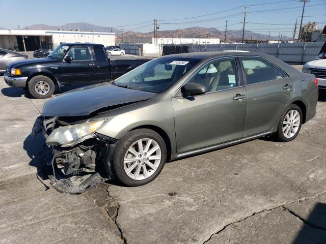 TOYOTA CAMRY HYBR 2013 with VIN 4T1BD1FK2DU092556 - Photo from auction