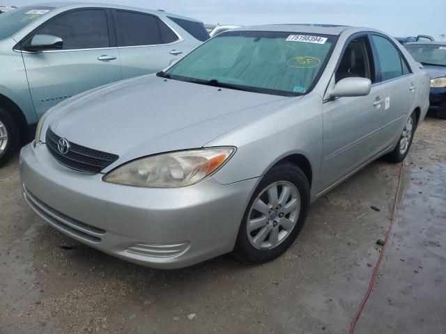 TOYOTA CAMRY LE 2002 with VIN 4T1BF30K42U522955 - Photo from auction