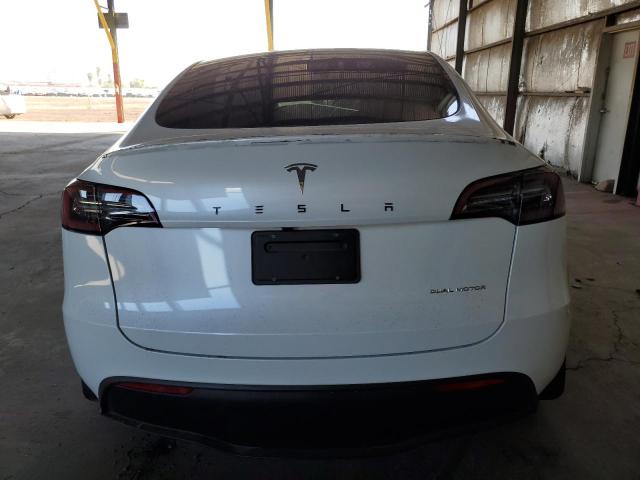 Photo 6 from auction – 2023 TESLA MODEL Y with VIN 7SAYGDEE3PF810392
