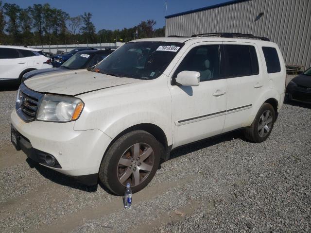 HONDA PILOT TOUR 2014 with VIN 5FNYF3H92EB025609 - Photo from auction