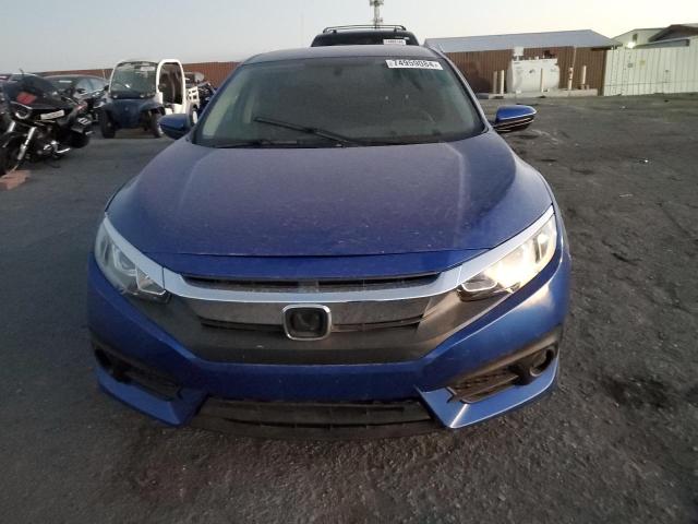 Photo 5 from auction – 2018 HONDA CIVIC LX with VIN 19XFC2F57JE012347