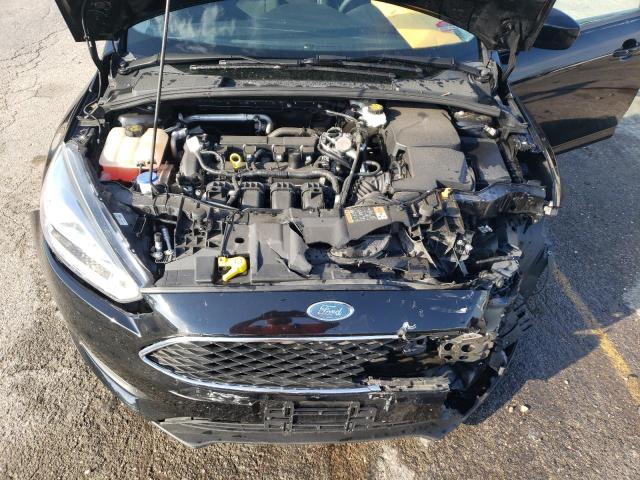 Foto 11 de la subasta – 2018 FORD FOCUS SE con VIN 1FADP3F20JL211017