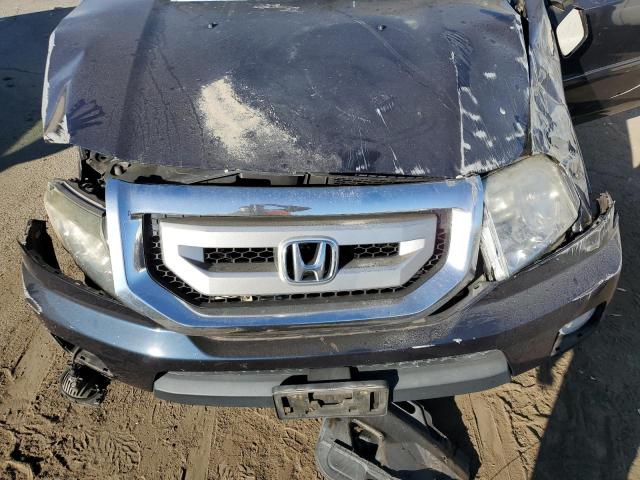 Photo 12 from auction – 2011 HONDA PILOT EX with VIN 5FNYF4H40BB103083
