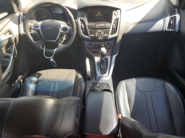 Photo 8 from auction – 2014 FORD FOCUS TITA with VIN 1FADP3J20EL161412