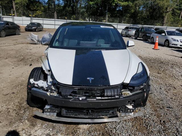 Photo 5 from auction – 2021 TESLA MODEL 3 with VIN 5YJ3E1EA2MF098140