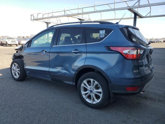 Photo 2 from auction – 2018 FORD ESCAPE SE with VIN 1FMCU9GD9JUC19639