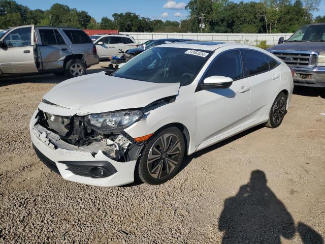 HONDA CIVIC EX 2016 with VIN 2HGFC1F32GH644454 - Photo from auction