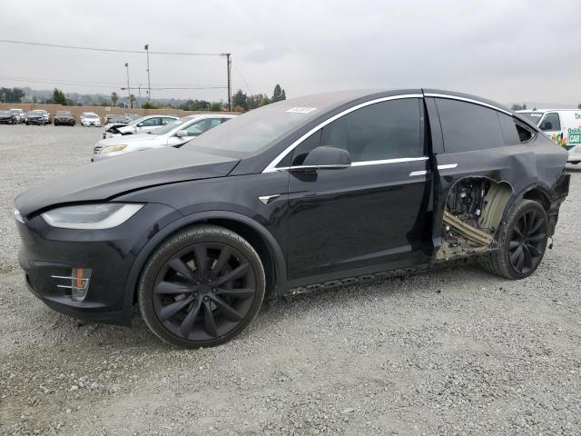 TESLA MODEL X 2018 with VIN 5YJXCBE21JF092671 - Photo from auction