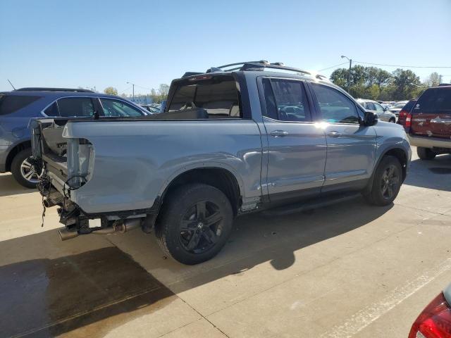 Photo 3 from auction – 2023 HONDA RIDGELINE with VIN 5FPYK3F89PB023968
