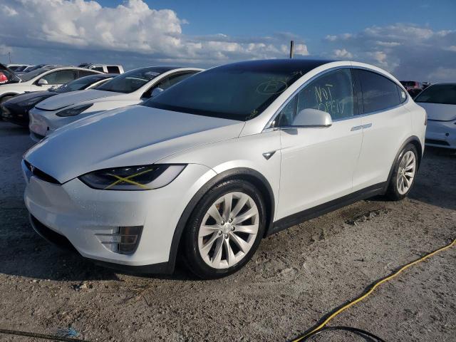 TESLA MODEL X 2018 with VIN 5YJXCDE25JF113209 - Photo from auction