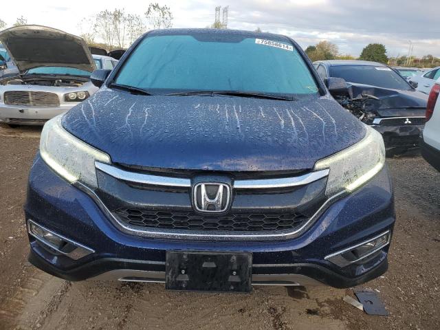 Photo 5 from auction – 2016 HONDA CR-V EX with VIN 5J6RM4H59GL105142