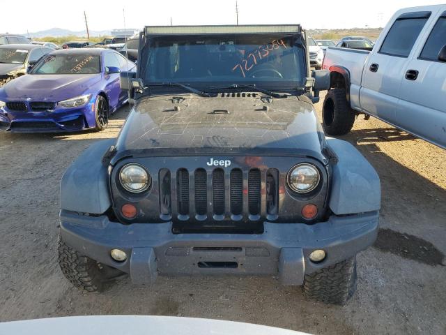 Photo 5 from auction – 2013 JEEP WRANGLER U with VIN 1C4BJWDGXDL558443