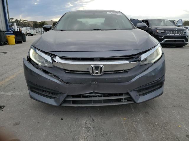 Photo 5 from auction – 2017 HONDA CIVIC LX with VIN 19XFC2F58HE057663
