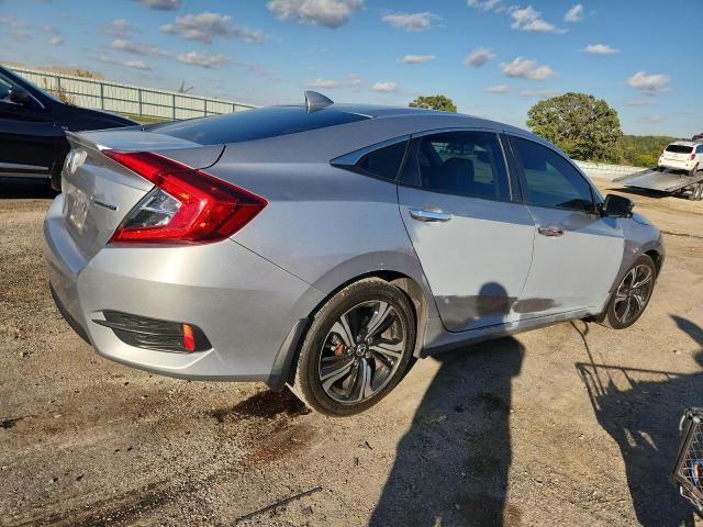 Photo 3 from auction – 2016 HONDA CIVIC TOUR with VIN 19XFC1F91GE025875