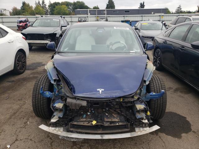 Photo 5 from auction – 2021 TESLA MODEL 3 with VIN 5YJ3E1EB7MF051582