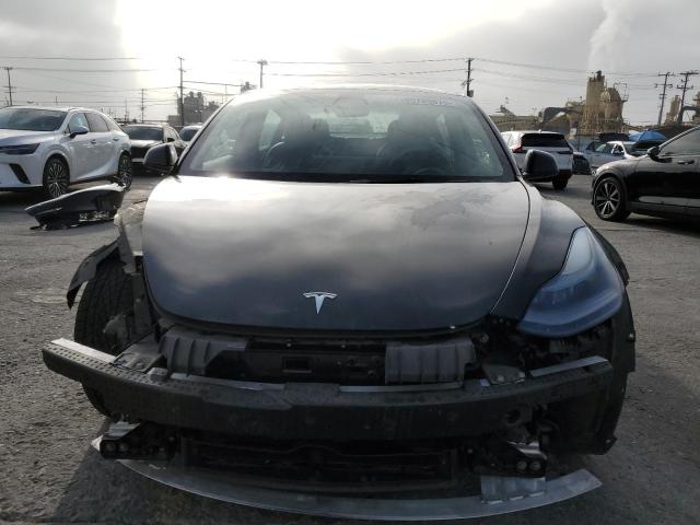 Photo 5 from auction – 2022 TESLA MODEL 3 with VIN 5YJ3E1EA7NF362521