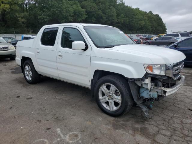 Photo 4 from auction – 2010 HONDA RIDGELINE with VIN 5FPYK1F53AB009274