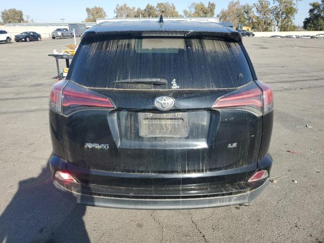 Photo 6 from auction – 2018 TOYOTA RAV4 LE with VIN 2T3ZFREV0JW493531