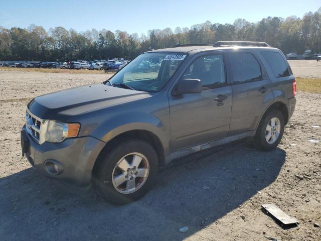 FORD ESCAPE XLT 2011 with VIN 1FMCU0D76BKA50882 - Photo from auction