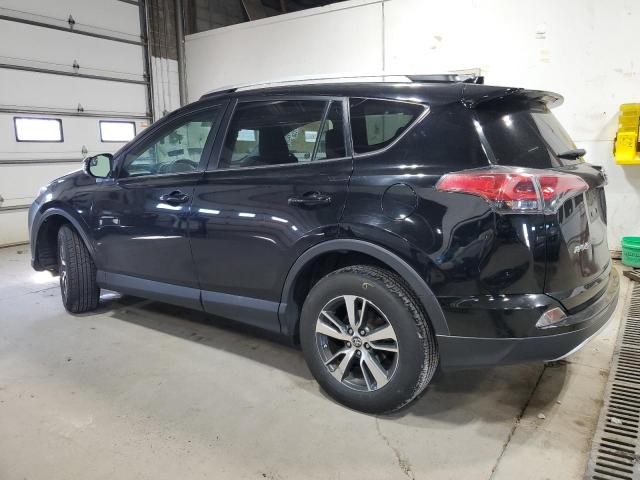 Photo 2 from auction – 2016 TOYOTA RAV4 XLE with VIN 2T3RFREV1GW427272