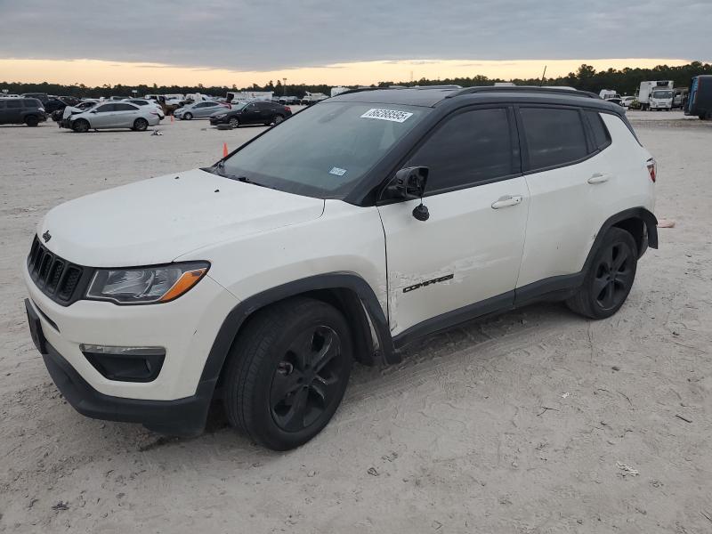 JEEP COMPASS LA 2021 with VIN 3C4NJCBB0MT560404 - Photo from auction