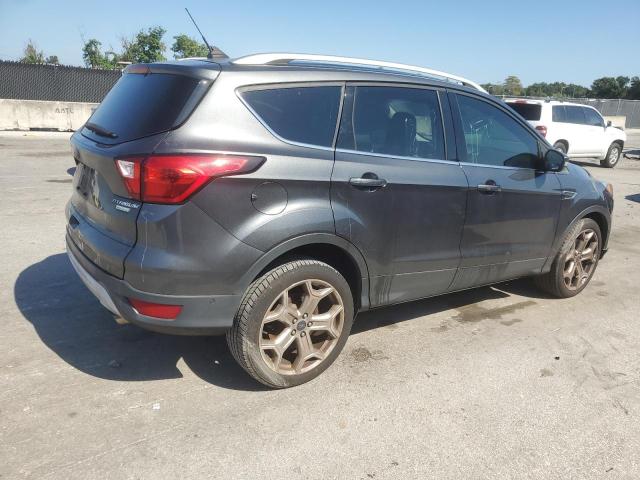 Photo 3 from auction – 2019 FORD ESCAPE TIT with VIN 1FMCU0J98KUB99210