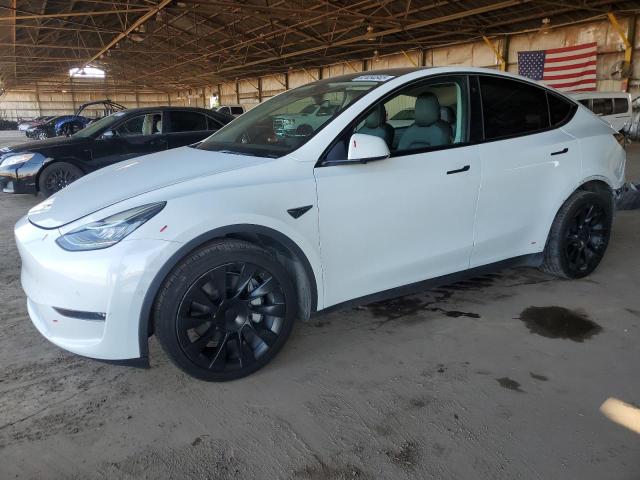 TESLA MODEL Y 2022 with VIN 7SAYGDEE6NF354403 - Photo from auction