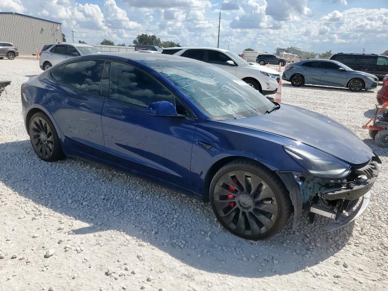 Photo 4 from auction – 2022 TESLA MODEL 3 with VIN 5YJ3E1EC5NF329972