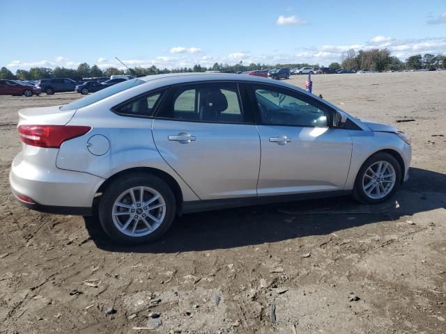 Photo 3 from auction – 2018 FORD FOCUS SE with VIN 1FADP3FEXJL285409