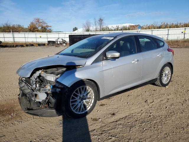 FORD FOCUS TITANIUM 2014 with VIN 1FADP3N20EL383622 - Photo from auction