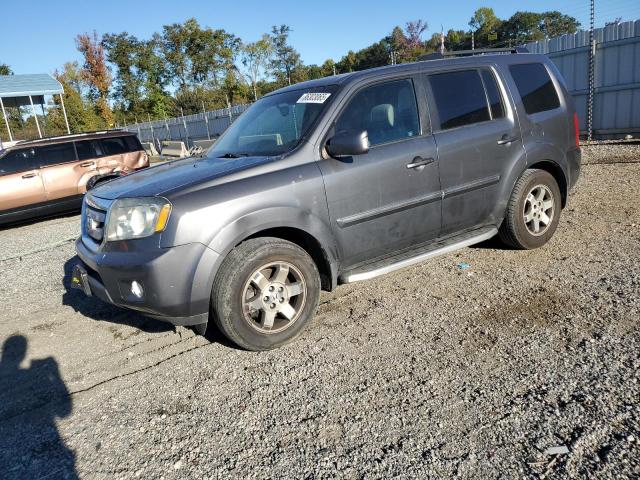 HONDA PILOT TOUR 2011 z numerem VIN 5FNYF4H90BB067391 - Zdjęcie z aukcji