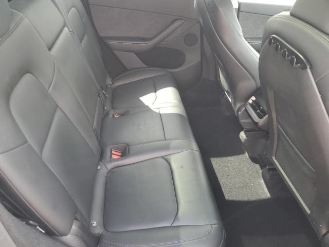 Photo 11 from auction – 2023 TESLA MODEL Y with VIN 7SAYGDEE7PA122831