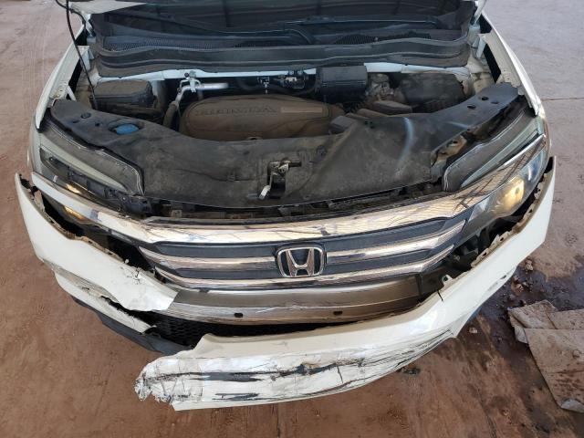 Photo 12 from auction – 2018 HONDA PILOT LX with VIN 5FNYF6H11JB049843