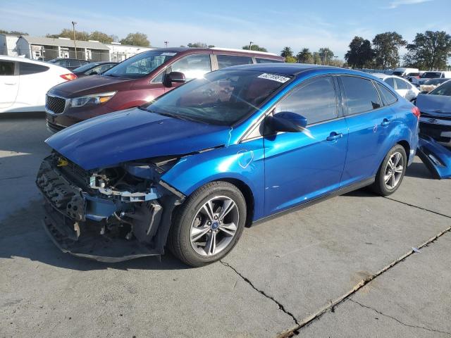 FORD FOCUS SE 2018 with VIN 1FADP3F24JL279157 - Photo from auction