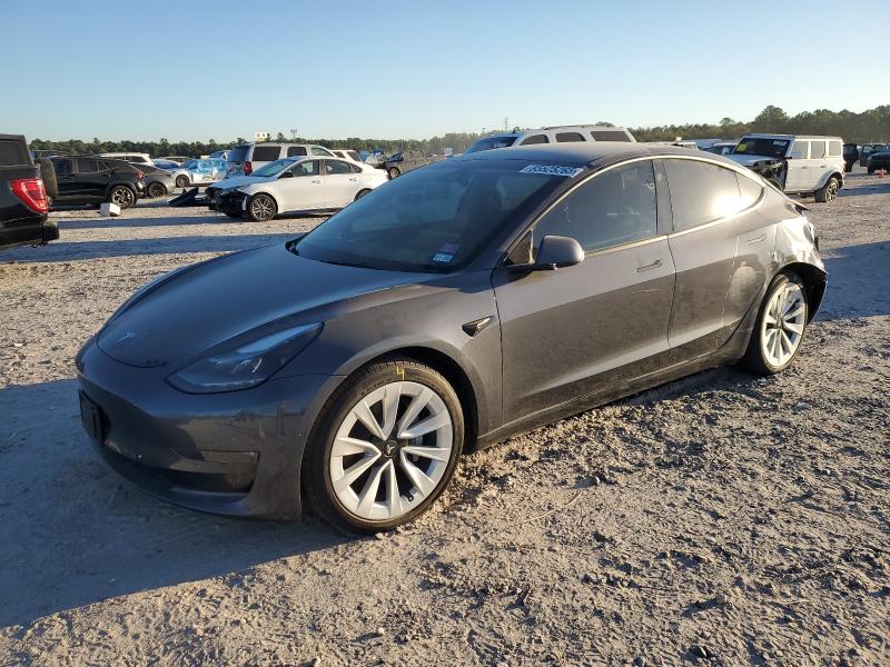 TESLA MODEL 3 2022 with VIN 5YJ3E1EB0NF128486 - Photo from auction