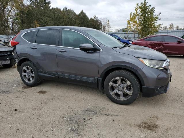 Photo 4 from auction – 2017 HONDA CR-V EX with VIN 2HKRW2H53HH137353