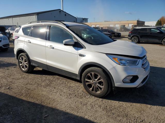 Photo 4 from auction – 2018 FORD ESCAPE SE with VIN 1FMCU9GD2JUC95736