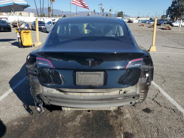 Photo 6 from auction – 2022 TESLA MODEL 3 with VIN 5YJ3E1EA2NF299957