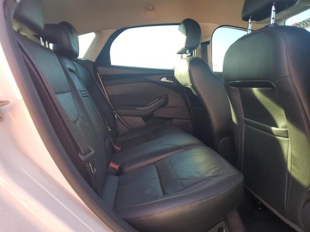 Фото 11 с аукциона – 2015 FORD FOCUS SE с VIN 1FADP3K23FL358297