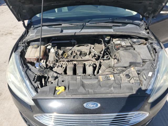 Photo 11 from auction – 2015 FORD FOCUS with VIN 1FADP3J24FL281084