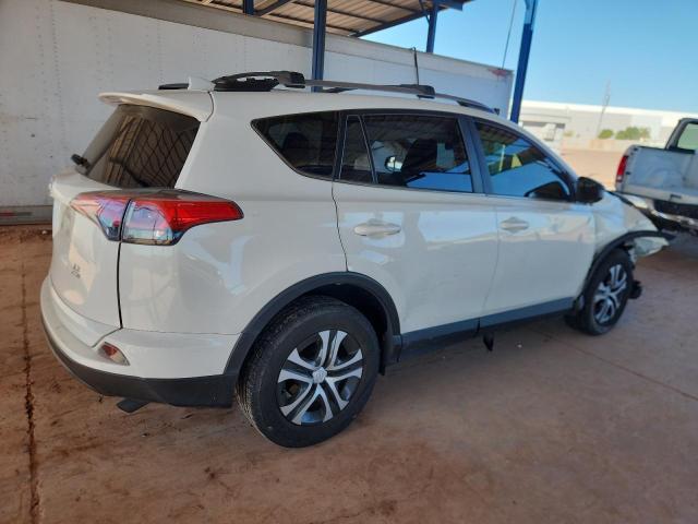 Photo 3 from auction – 2017 TOYOTA RAV4 LE with VIN JTMBFREV4HJ131549