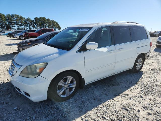 HONDA ODYSSEY EX 2010 with VIN 5FNRL3H72AB078980 - Photo from auction